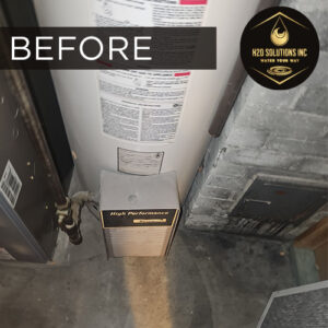 H2O Solutions EcoWater whole-home water softening system installation before photo