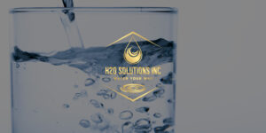 Water being poured into glass and H2O Solutions logo overlayed on top