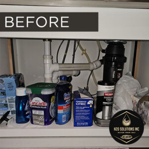 H2O Solutions EcoWater reverse osmosis under-sink drinking water system before installation photo
